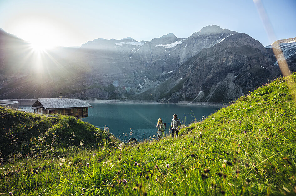 Hiker with mountain lake in the background